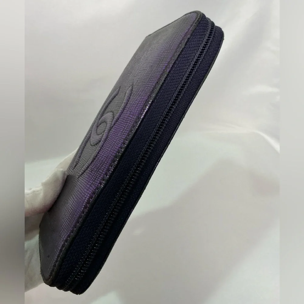 Authentic CHANEL Iridescent Purple Caviar Zip Lizard Embossed Yen Wallet